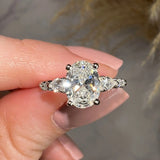 "Arianna" Oval Cut Diamond Shoulders Engagement Ring Life Style- Front View
