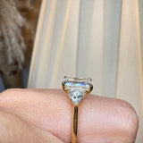 "Brenzy" Emerald Cut 2.5 Carat Three Stone Trilogy Engagement Ring life style-Side view