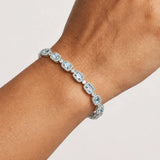 Emerald Shape 11 Carat Aquamarine Tennis Bracelet Featuring Diamond Halo BRHAEC