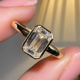 "Gracey" Solitaire Emerald Cut Bezel Diamond Engagement Ring Life Style- Front View