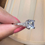 "Hope" Cushion Cut 3 Carat Trilogy Platinum Engagement Ring lifestyle-Top View