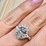 "Lina" Oval Cut 1 carat halo Platinum Engagement Ring Life style- Top view