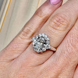 "Lina" Oval Cut 1 carat halo Platinum Engagement Ring Life style- Top view