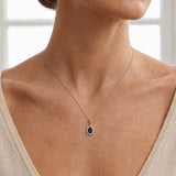 Oval Sapphire with Diamond Halo Pendant
