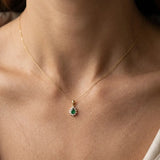 Pear Cut Emerald Cluster Pendant with Diamond Halo