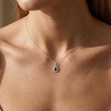 Pear Cut Emerald Cluster Pendant with Double Diamond Halo