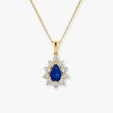 Pear Cut Sapphire Pendant with Diamond Halo