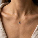 Pear Cut Sapphire Pendant with Diamond Halo